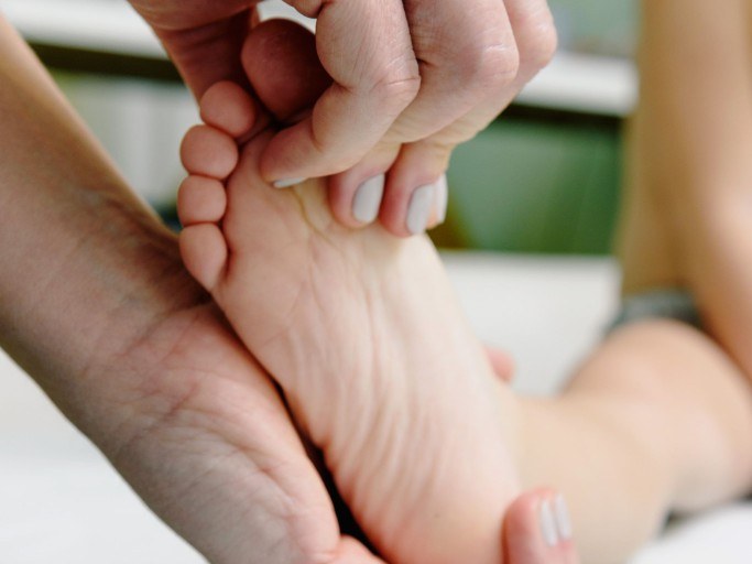 Podiatrist examining a child’s foot at Coburg Podiatry